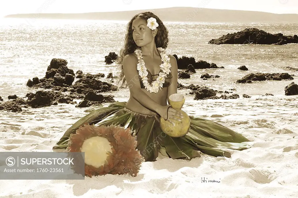 Beautiful Hawaiian girl sitting on beach with hula implements, hand colored