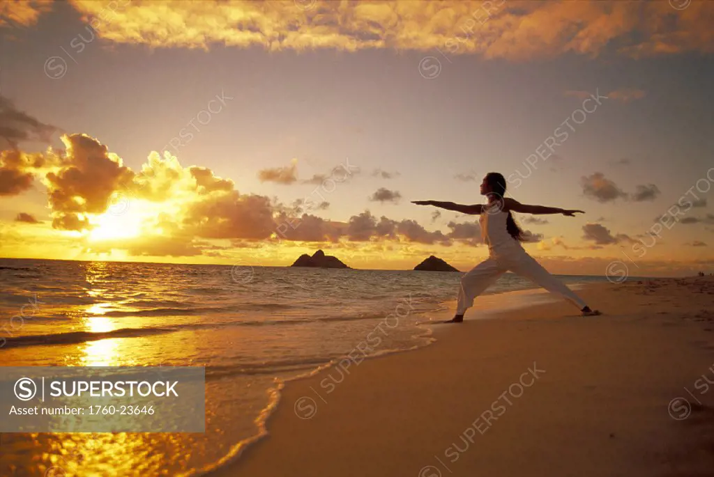 Hawaii Oahu woman yoga at sunrise on Lanikai Beach, calm tropical D1184  outstretched