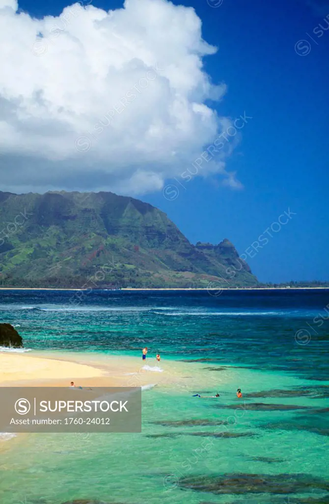 Hawaii, Kauai, Princeville Beach looking toward Bali Hai, Snorklers in water