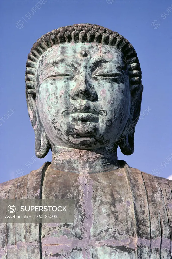 Maui, Lahaina, closeup of Amitabha Buddha statue, front view, blue sky bkgd