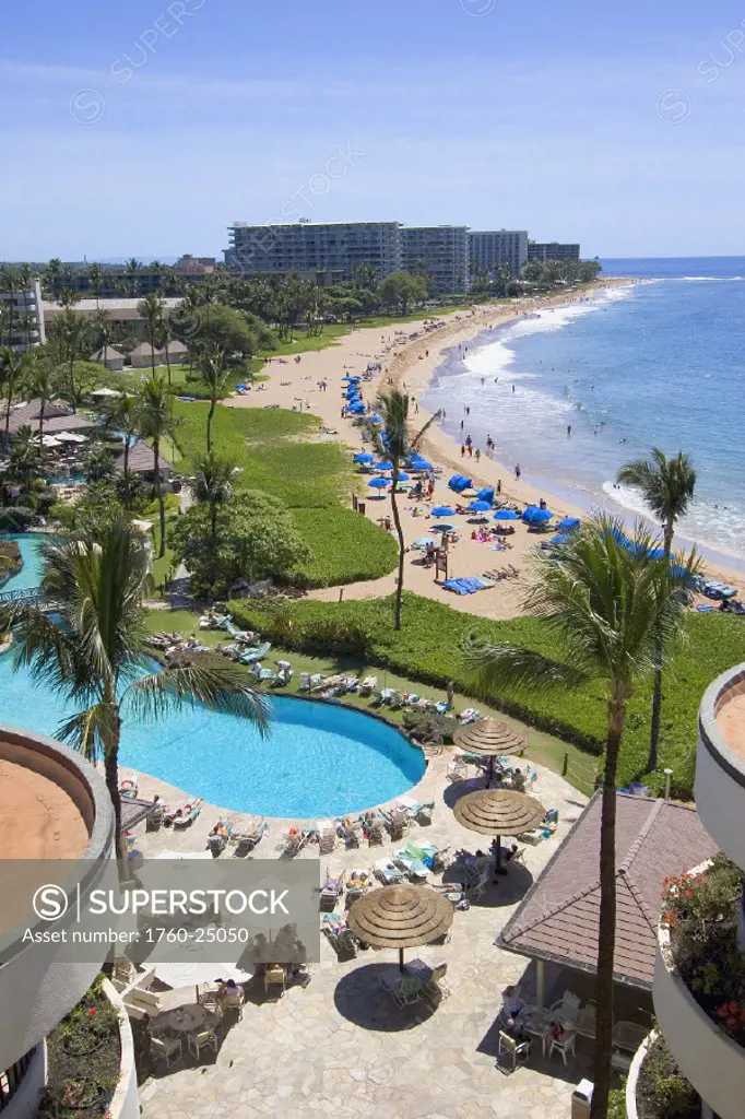 Hawaii, Maui, Kaanapali Beach from Sheraton hotel, Resort hotels and people on the beach.