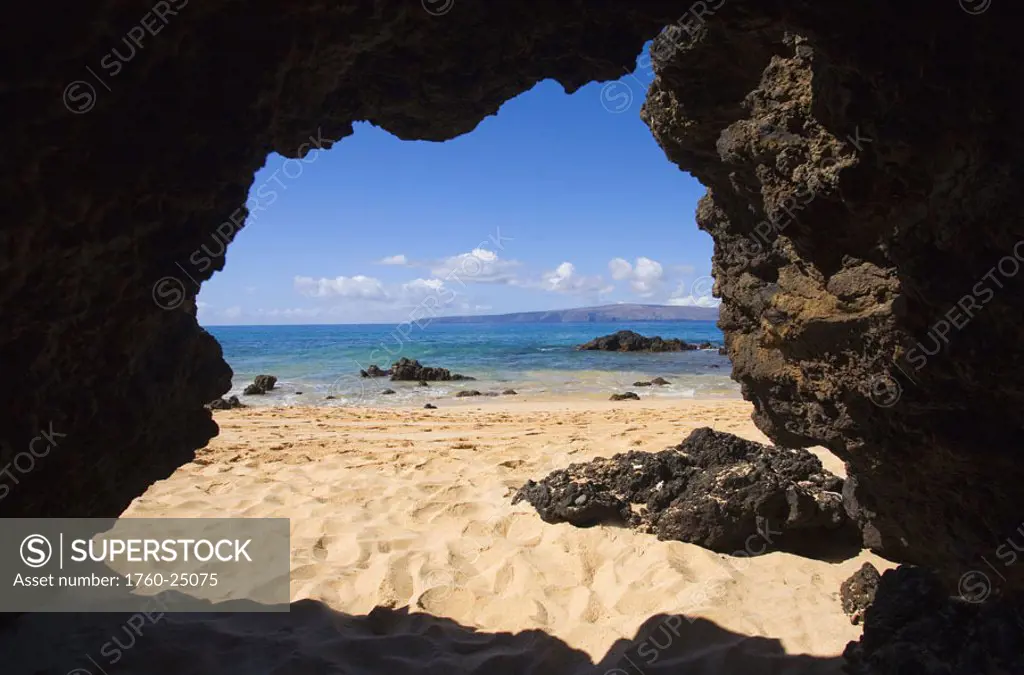 Hawaii, Maui, Makena, View from Secret beach of Kahoolawe from inside of a lavatube cavern.
