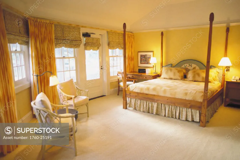 Hawaii, Lanai, The Lodge at Koele, interior of suite with golden lighting, windows open