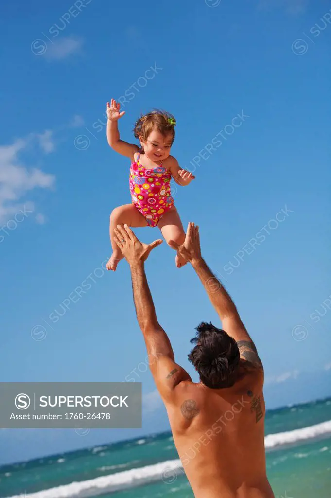 Hawaii, Maui, Father and Daughter enjoying a day on the beach.