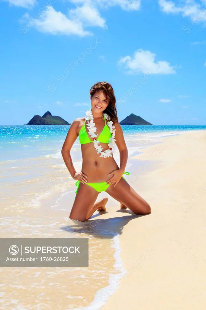 Hawaii, Oahu, Lanikai, Beautiful woman on the beach.