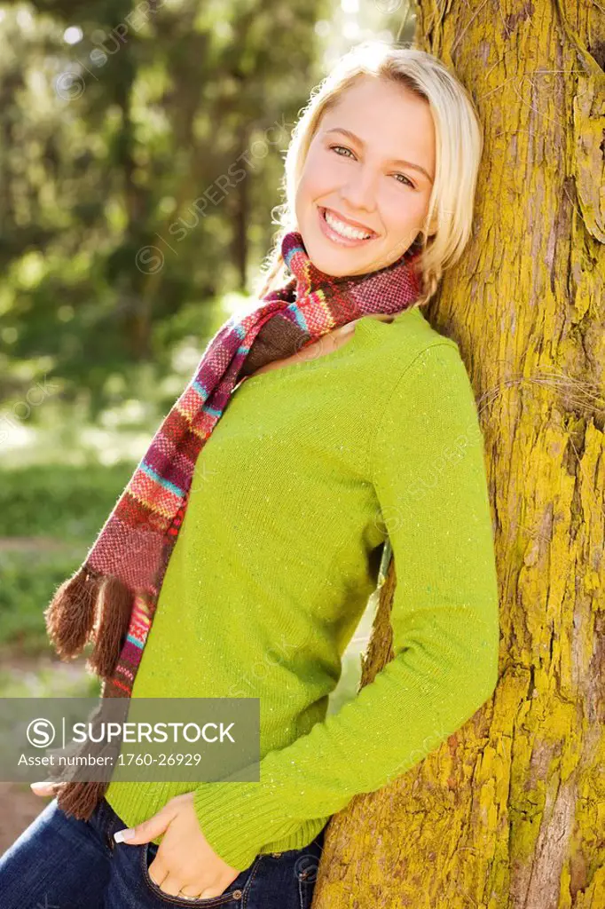 Hawaii, Oahu, Young woman dressed in warm winter clothes.