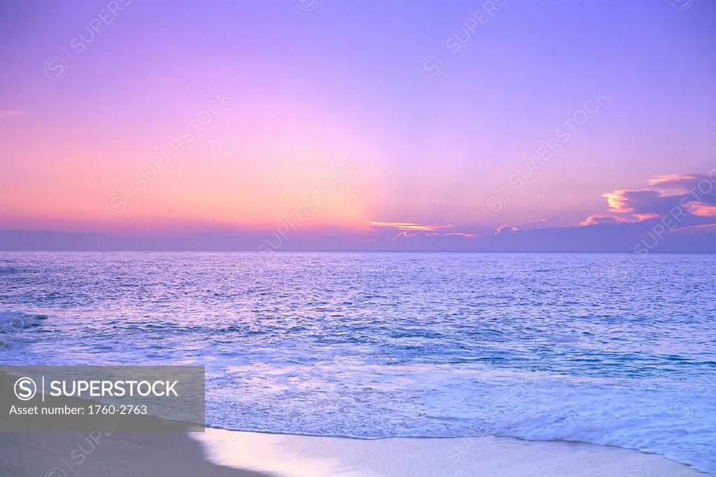 Lavender sky w/ hues of pink and yellow, shoreline water to ocean C1699
