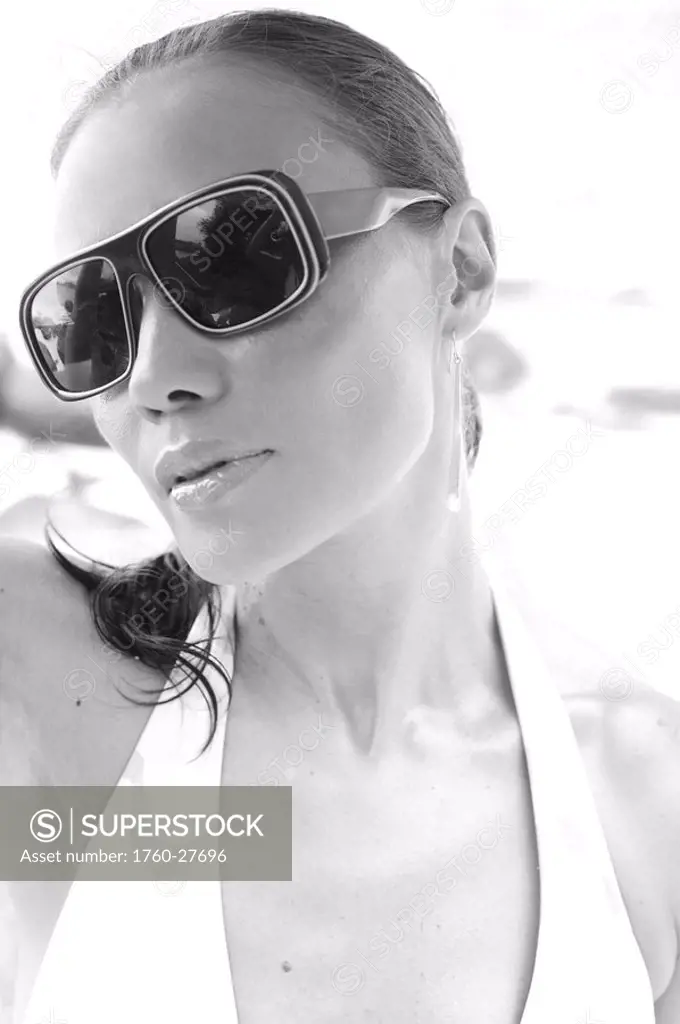 Hawaii, Kauai, Fashion headshot of a model wearing stylish glasses, black and white.