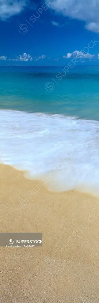 Shorebreak water action upon sand, turquoise water, blue sky, clouds, panoramic C1747