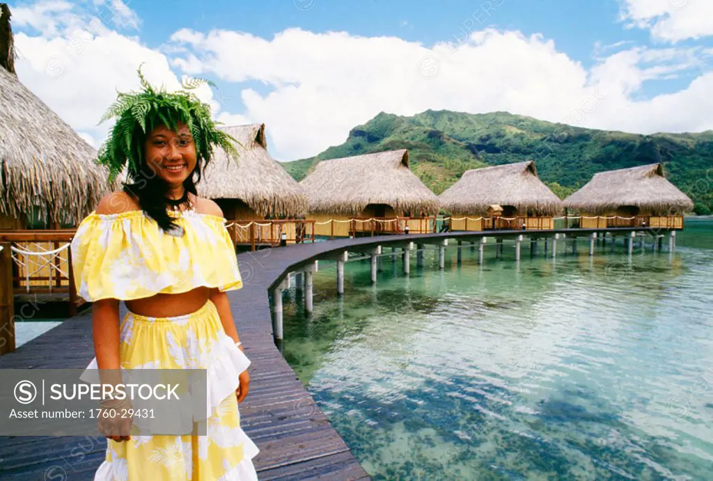 French Polynesia, Huahine, Sofitel Heiva Hotel bungalows, Polynesian woman.