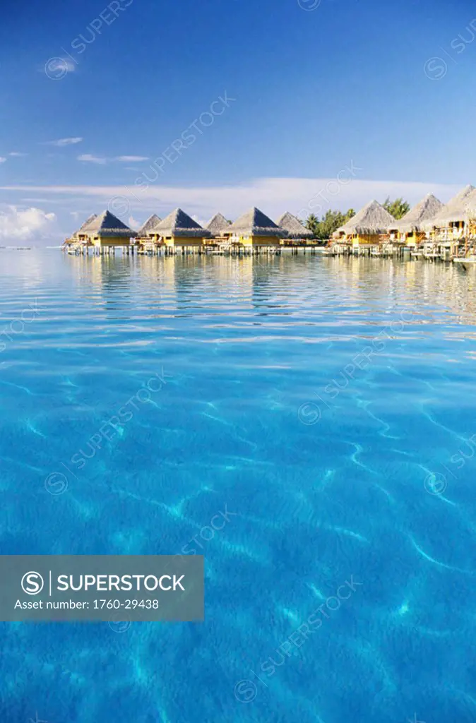French Polynesia, Tahiti, Bora Bora, Bungalows of the Hotel Moana, view from ocean