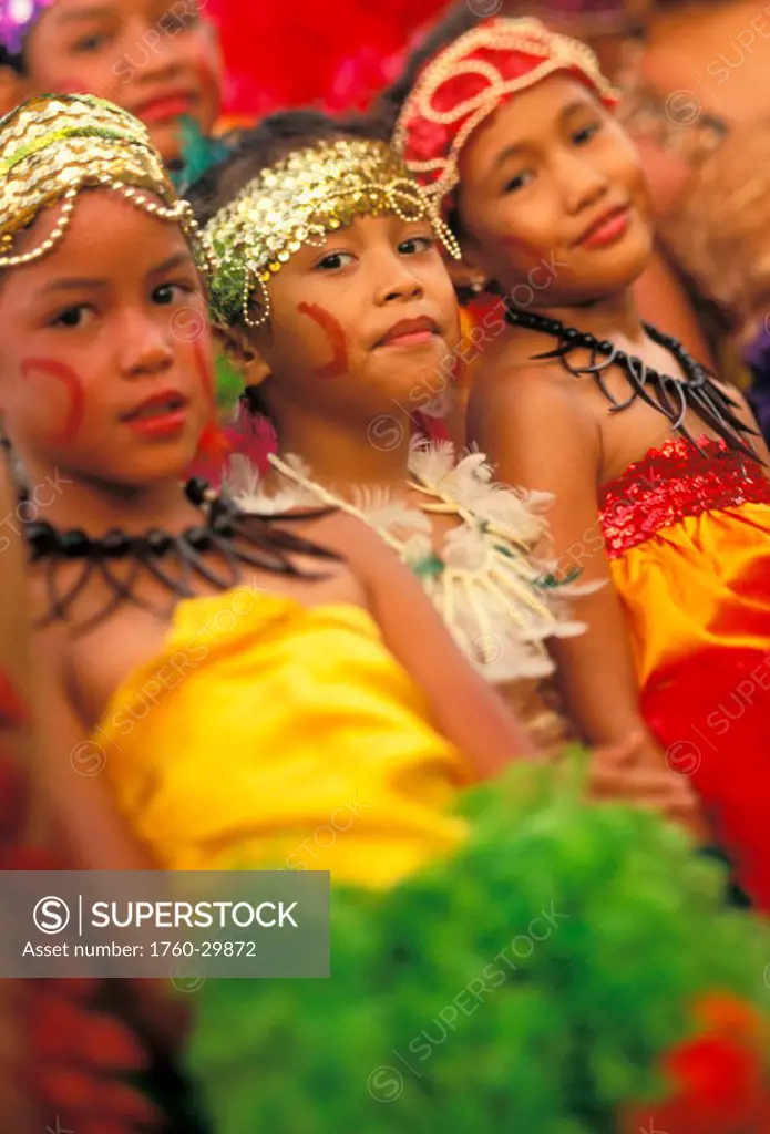 Samoa, Three children in colorful traditional dress with face painting ´NO MODEL RELEASE´