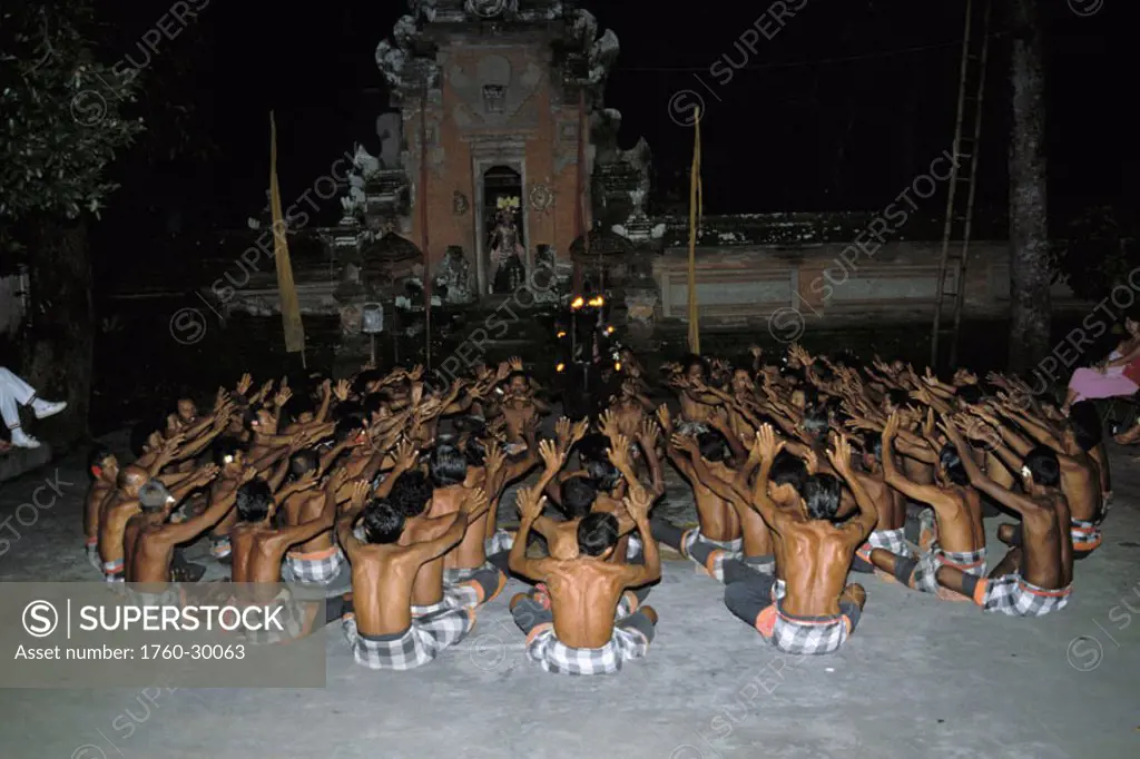 Indonesia, Bali, Shirtless local men performing kecak dance. NO MODEL RELEASE