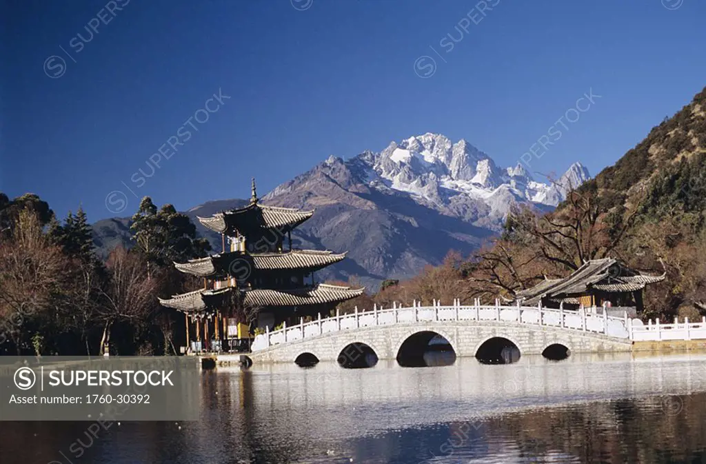 China, Lijang, Black Dragon Pool Park, Five Phoenix Pavilion, bridge and pagoda