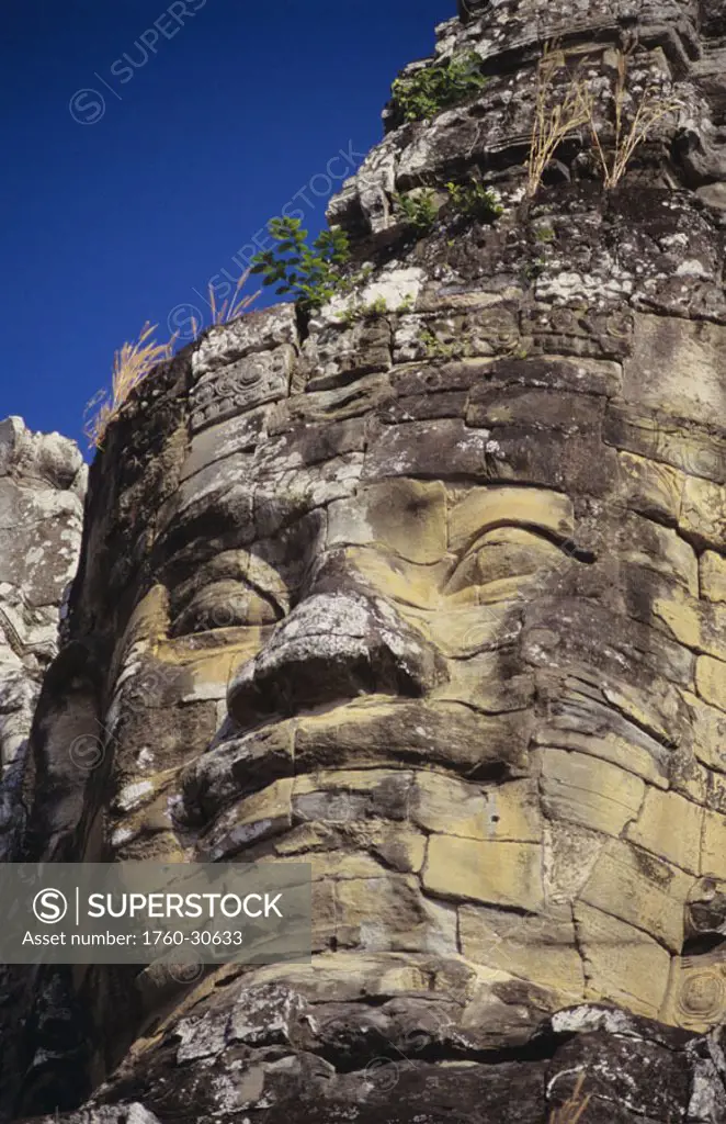 Cambodia, Angkor Thom, Bayon, South Gate, Stone face.