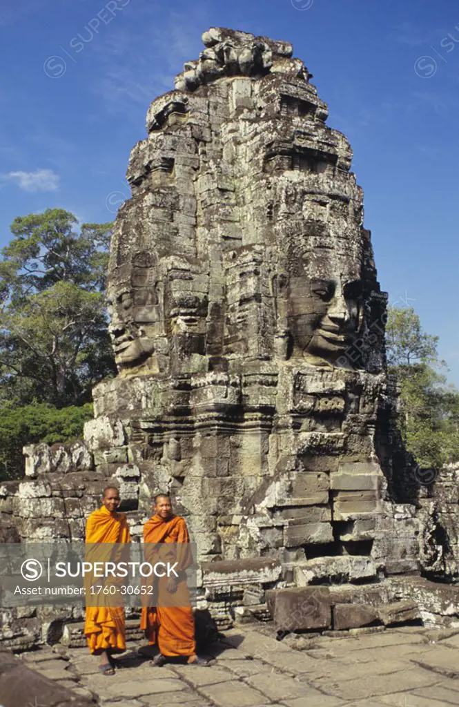 Cambodia, Siem Reap Angkor Thom, Bayon Temple, two monks standing