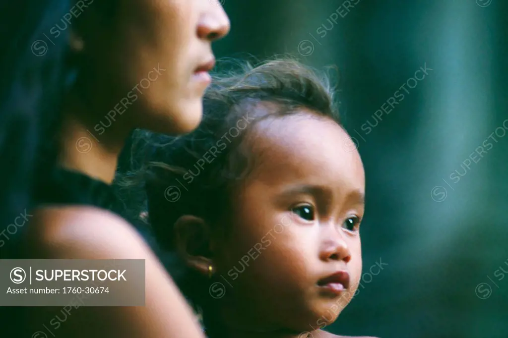 Cambodia, Phnom Phen, Close-up of mother and child.