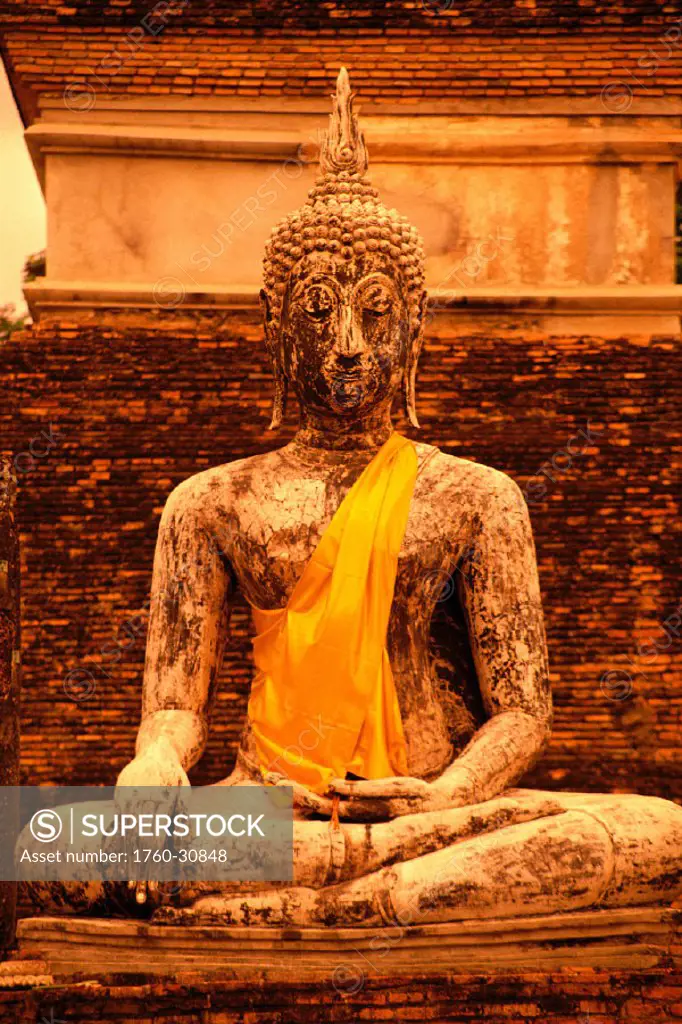 Thailand, closeup of religious statue of Budda at sunset