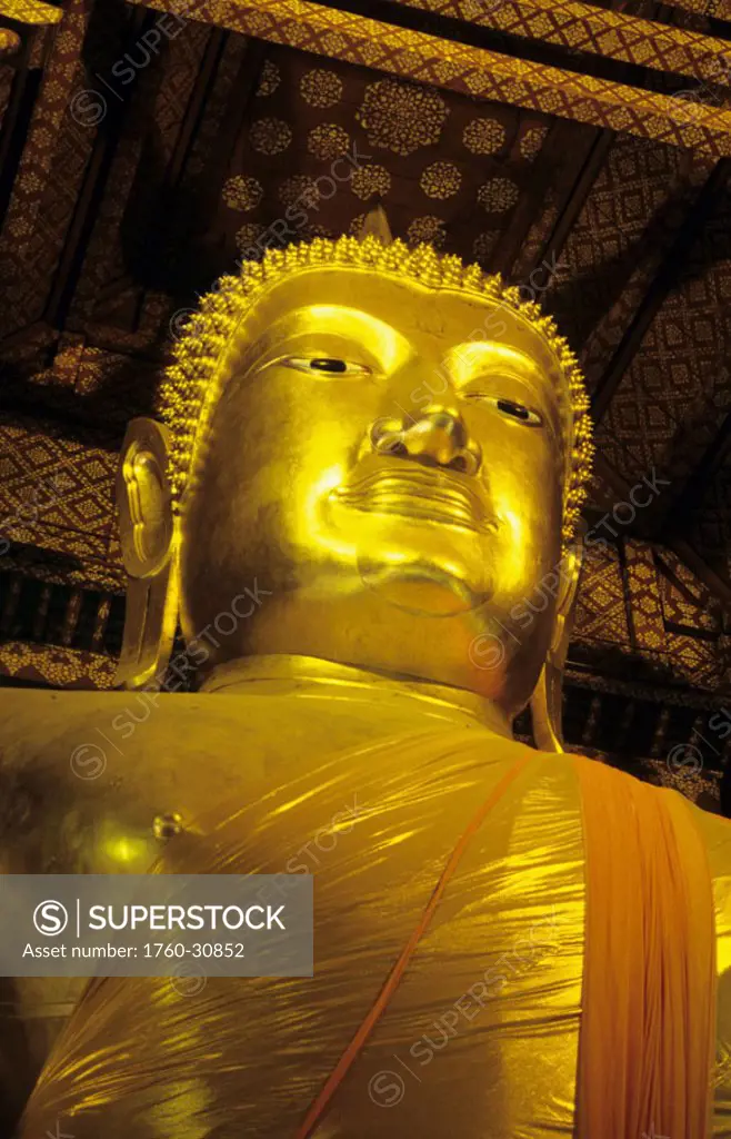 Thailand, Ayuthaya, Wat Panam Chong, Close-up of gold Buddha head and bust