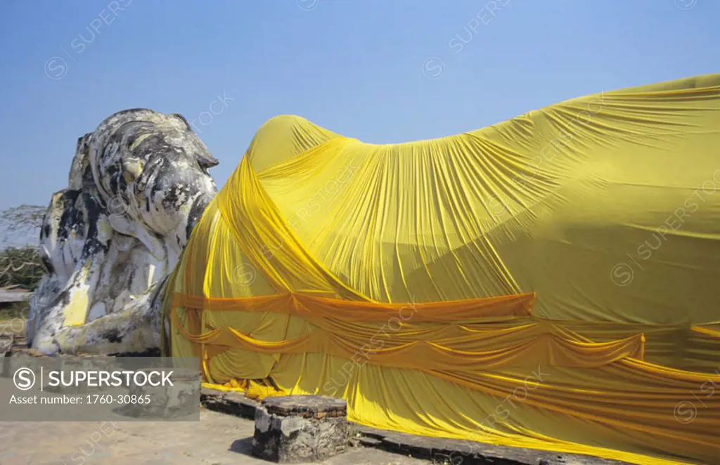 Thailand, Ayuthaya, Wat Logya Suthat, Reclining Buddha, yellow cloth draped over