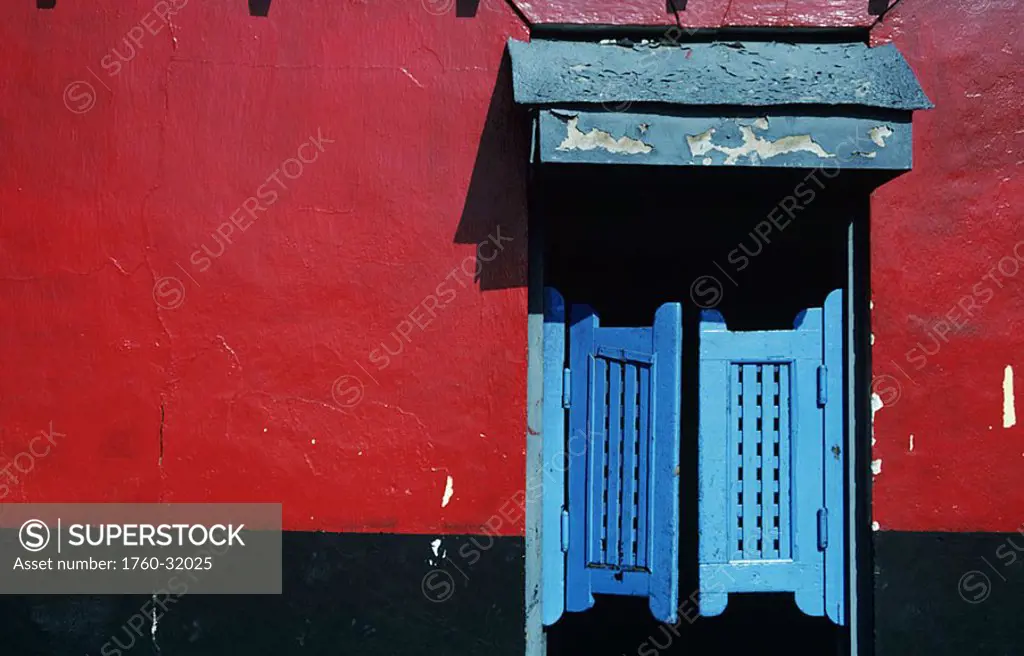 Caribbean, Bahamas, Nassau, Brightly colored wall and door on town building