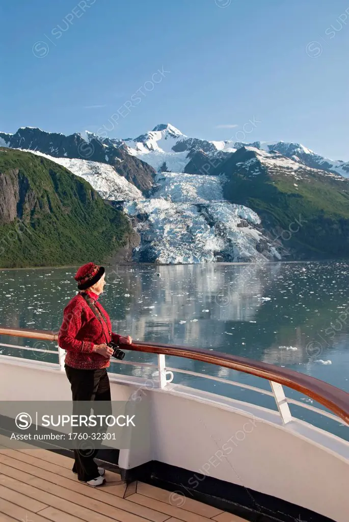 United States, Alaska, Inside Passage, College Fjord, Vasser Glacier, Tourist On Cruise Ship Has A View Of The Glacier