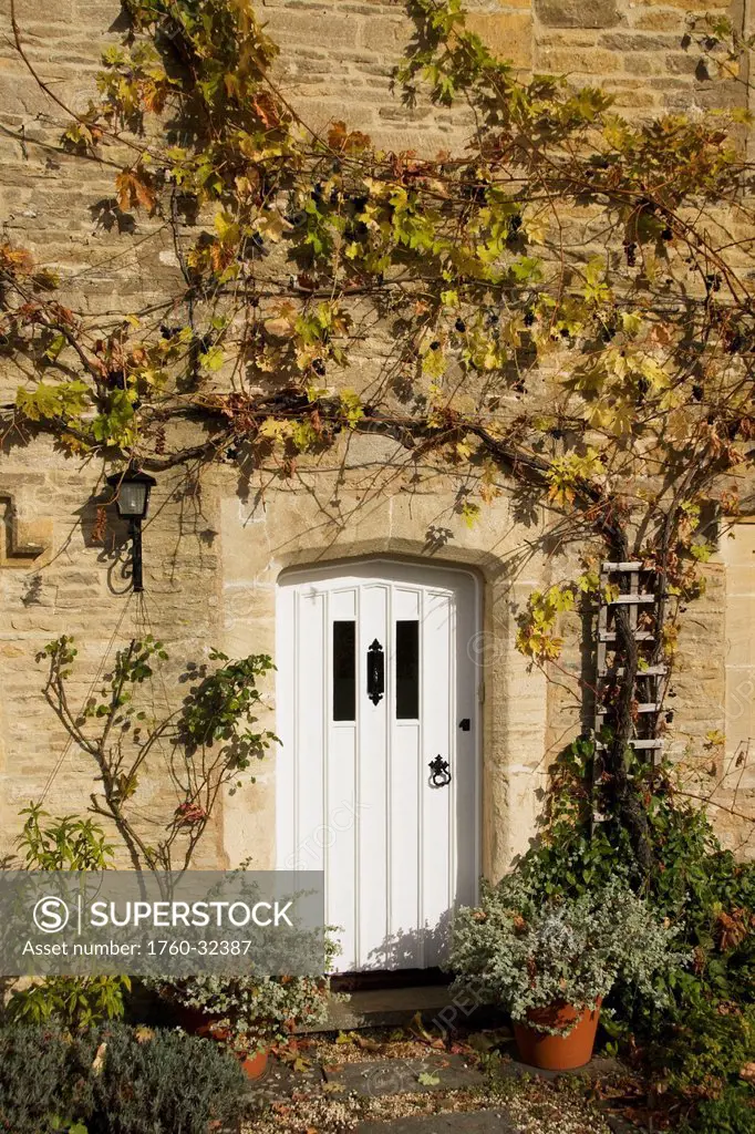 United Kingdom, England, Cotswolds, Lower Slaughter, Doorway Of Row House.