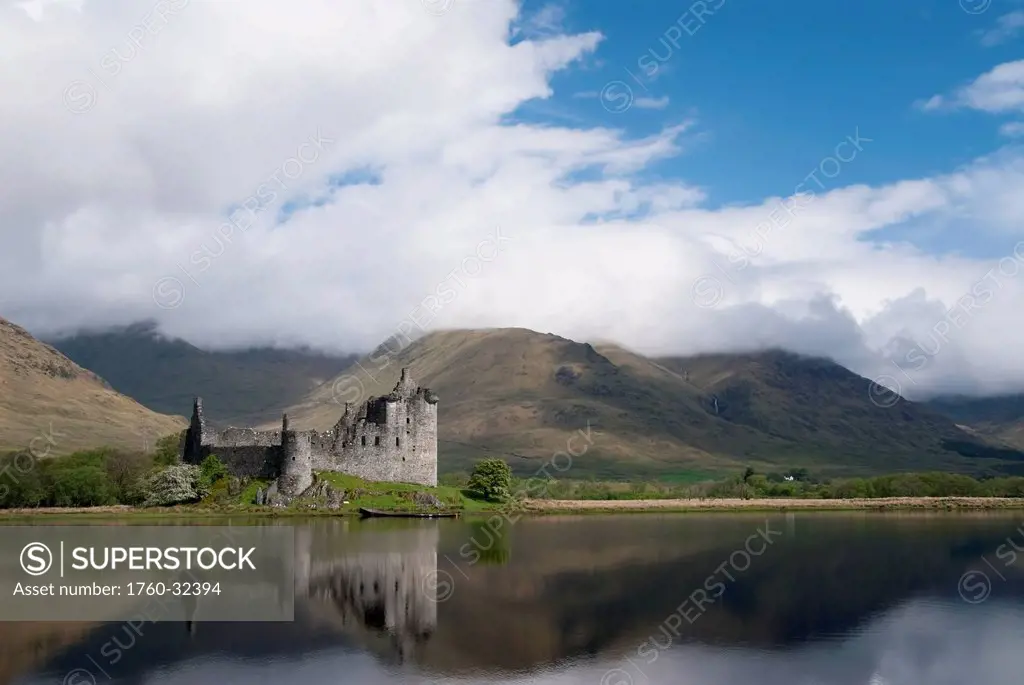 United Kingdom, Scotland, Kilcurn Castle On A Peninsula At The End Of Loch Awe, Castle Reflecting In Water.