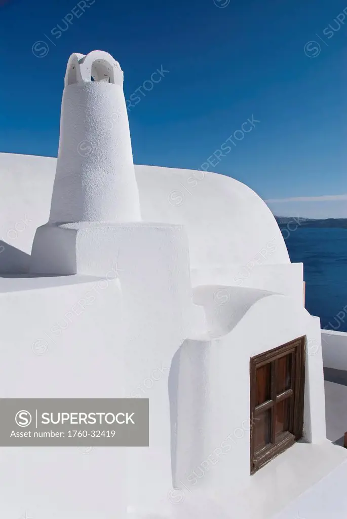 Greece, Santorini, Oia, Architectural Detail Of Greek Orthodox Chrurch, Mediterranean Sea And Island Of Thirassia In The Distance.