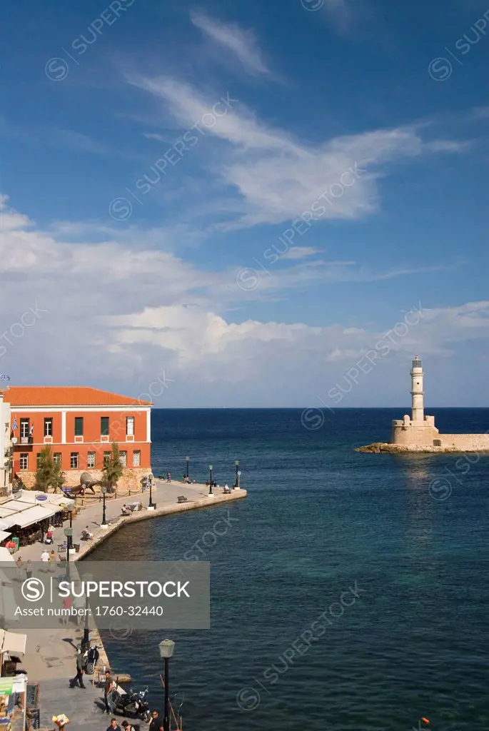 Greece, Crete, 16Th Century Venetian Harbor And Lighthouse, People Enjoying The Afternoon.