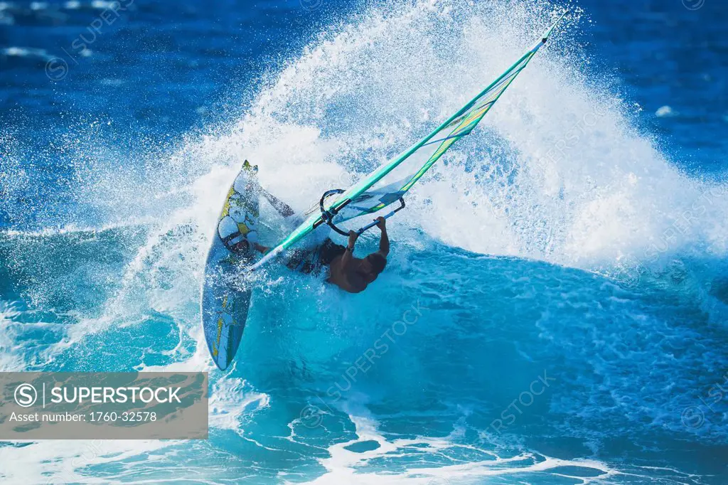 Hawaii, Maui, Ho'okipa, Professional Windsurfer Kauli Seadi Carves A Powerful Turn On A Wave. Editorial Use Only.