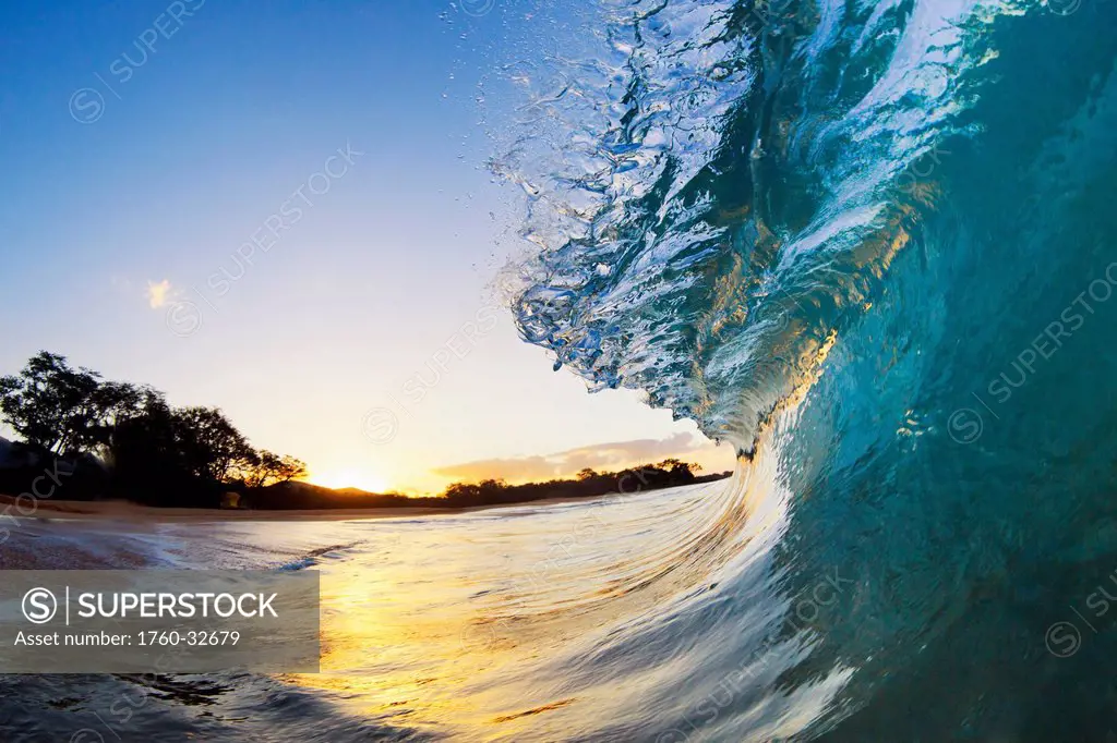 Hawaii, Maui, Makena, Beautiful Blue Ocean Wave Breaking At The Beach At Sunrise