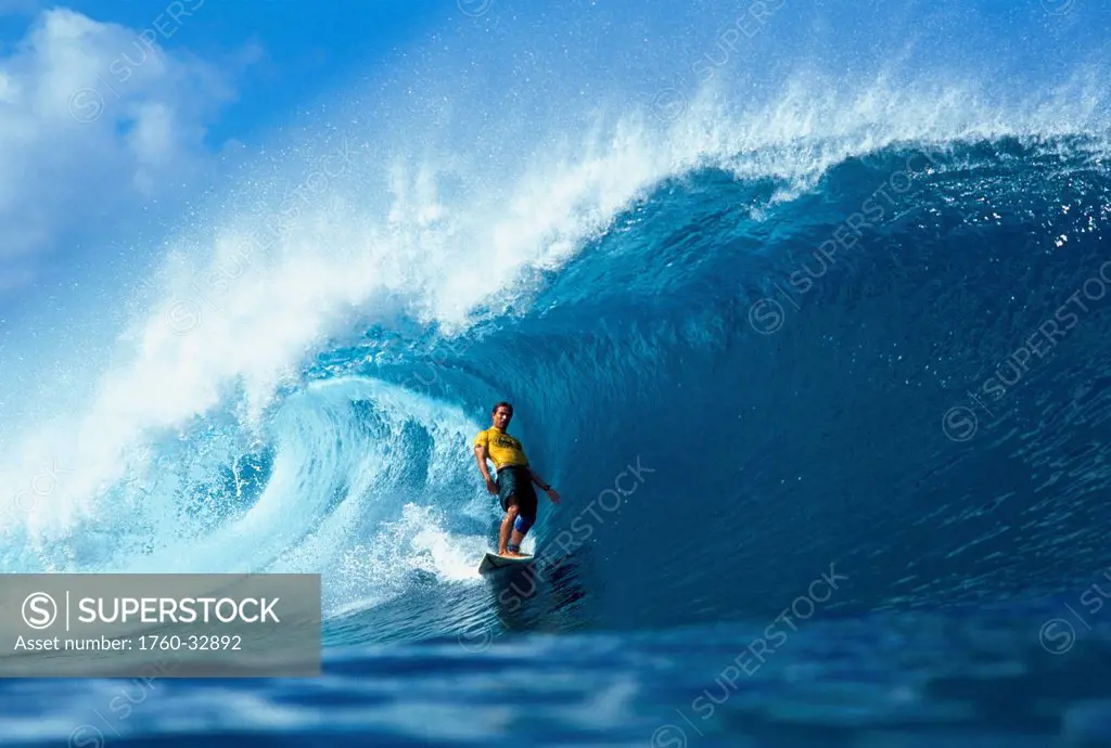 Hawaii, Oahu, North Shore, Seth Mckinney Leaning Back Surfs Tube At Pipeline