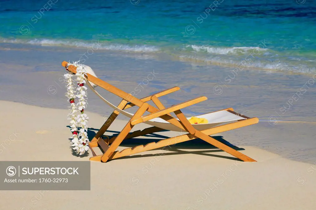 Hawaii, Oahu, Kailua, A Lounge Chair On The White Sandy Beach Of Lanikai.