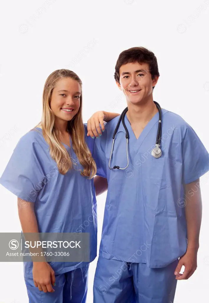 Young Medical Students In Scrubs.