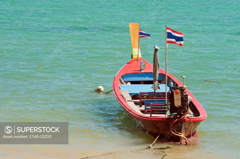 Thailand, Phuket, Rawaii Beach, Close Up Of Longtail Boats Along The In Water.