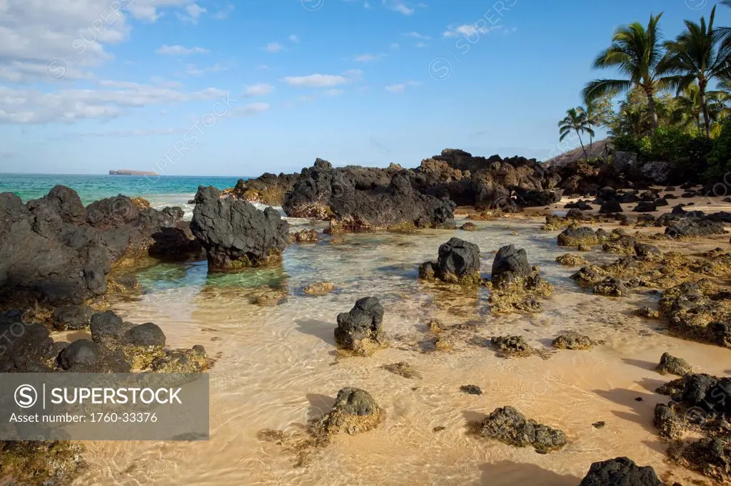 Hawaii, Maui, Makena, Beautiful Clear Ocean Among Lava Rock.