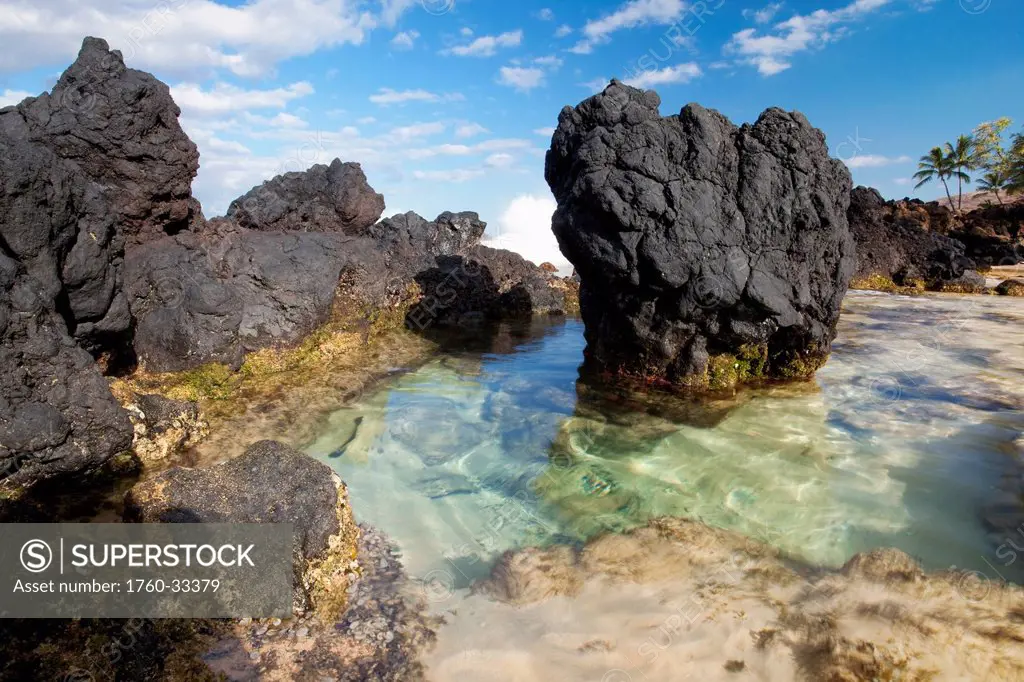 Hawaii, Maui, Makena, Beautiful Clear Ocean Among Lava Rock.