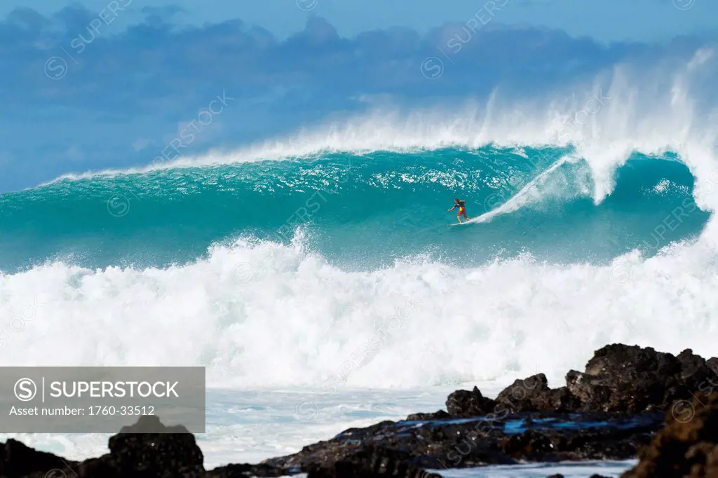 Hawaii, Maui, Laperouse, Professional Surfer Albee Layer riding a large wave at Laperouse Bay.