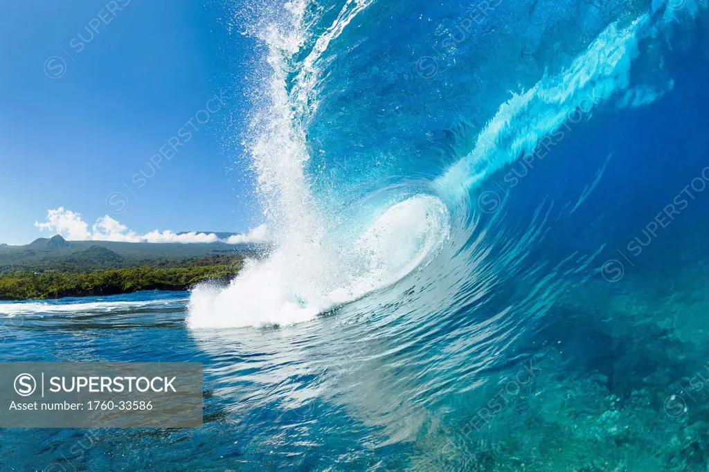 Hawaii, Maui, Hana, Beautiful blue ocean wave.