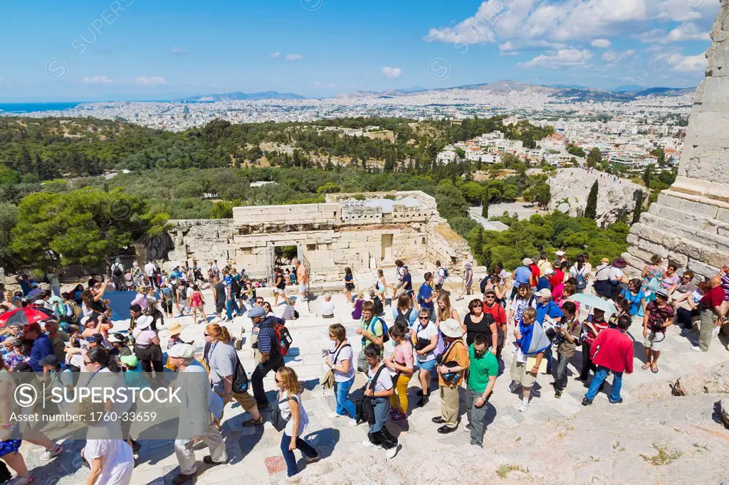 Greece, Athens, Tourists Walking around the Historic Ruins of the Parthenon.