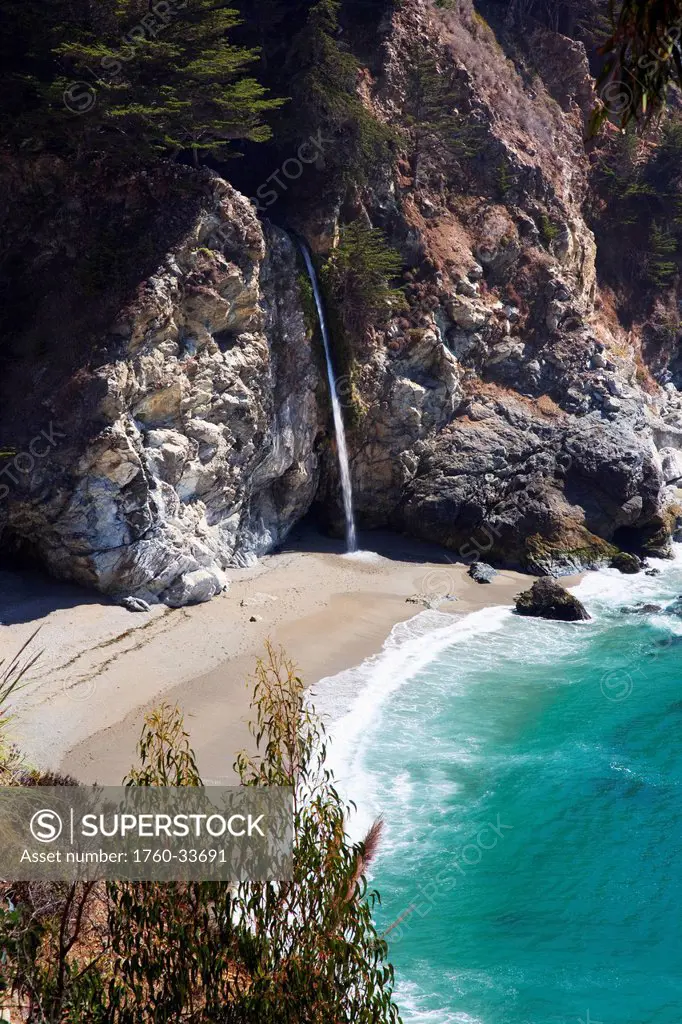 California, Big Sur, Julia Pfeiffer Burns State Park, View of McWay Falls flowing into the ocean in Northern California.