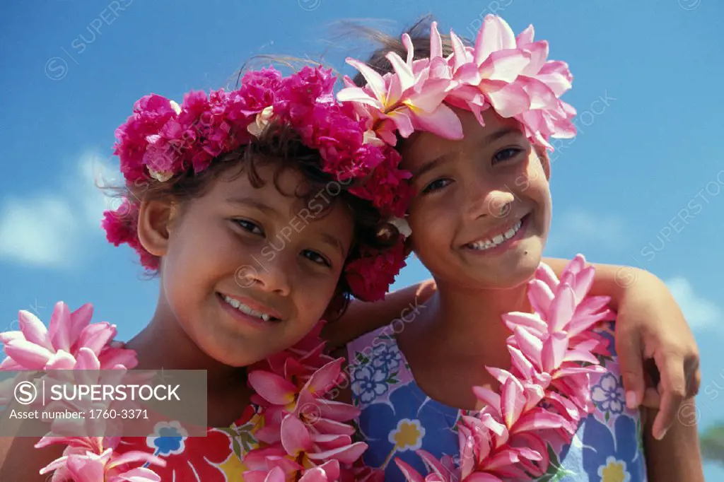 Two young girls, pink plumeria hakus and leis, closeup B1375