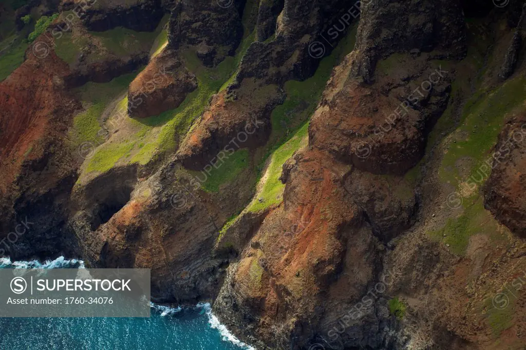 Aerial view of the rugged coastline along an hawaiian island; Hawaii, United States of America