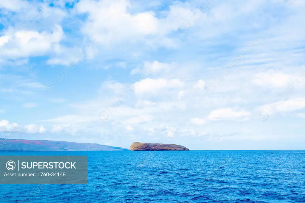 View of the coastline of an hawaiian island and a rock formation; Hawaii, United States of America