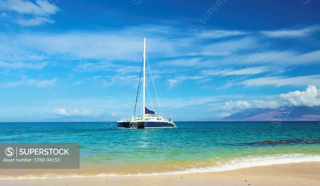 Boat mooring in the water off the shore of an hawaiian island; Hawaii, United States of America