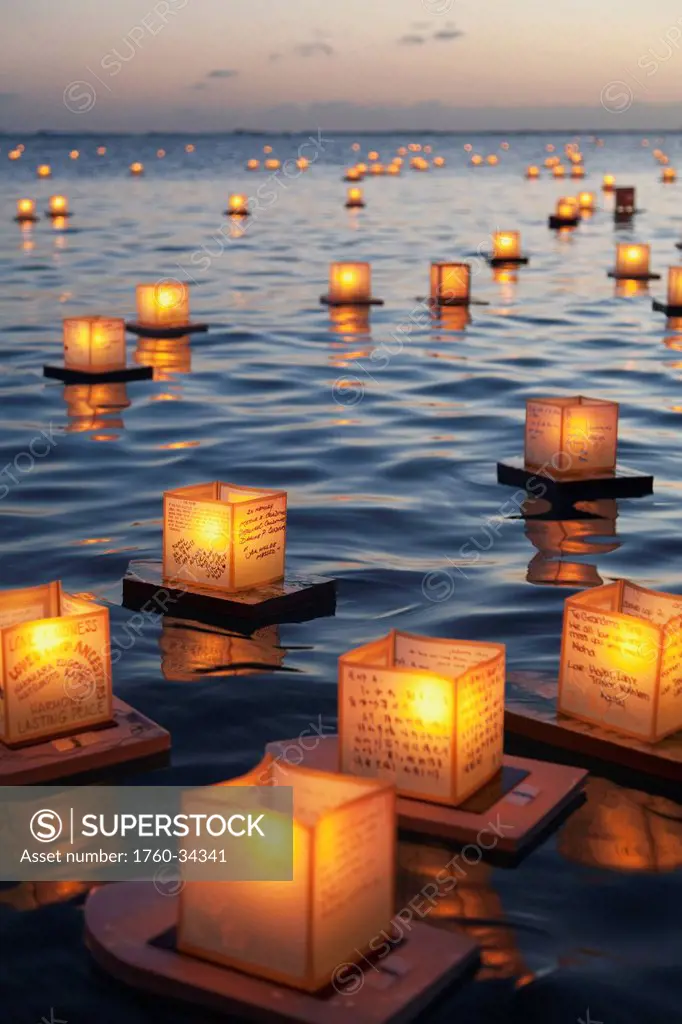 Annual lantern floating ceremony during sunset at Ala Moana; Oahu, Hawaii, United States of America