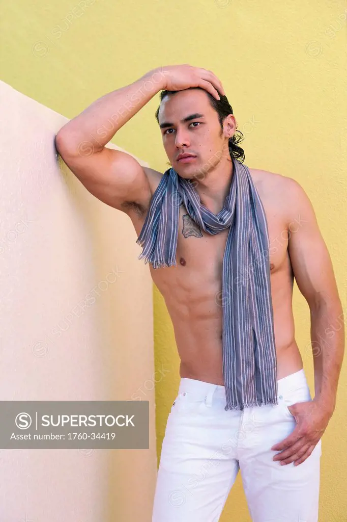 Portrait of a shirtless man wearing a scarf; Honolulu, Oahu, Hawaii, United States of America