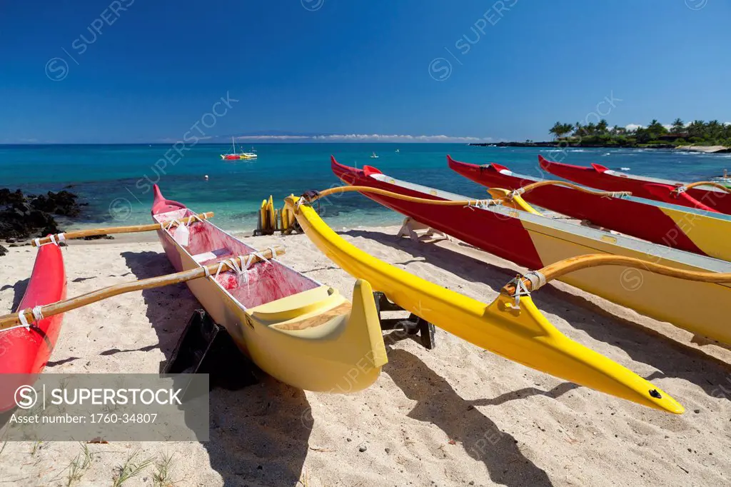 Outrigger canoes on Kuki'o Beach and Bay; Big Island, Hawaii, United States of America