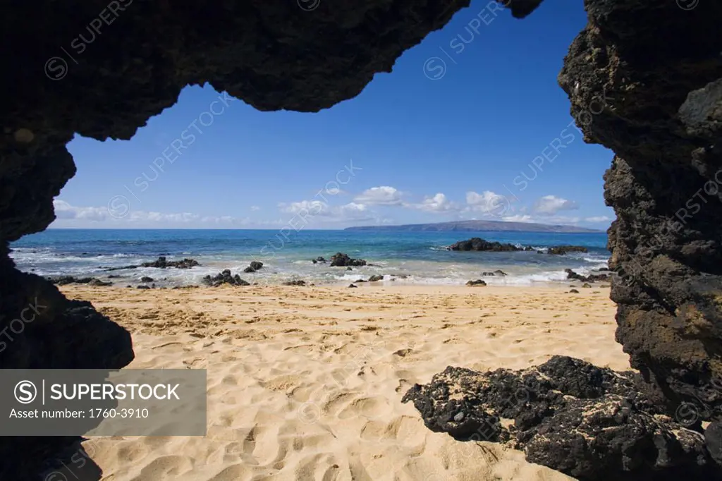 Hawaii, Maui, Makena, View from Secret beach of Kahoolawe from inside of a lavatube cavern.